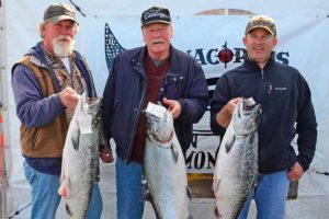 2014 Anacortes Salmon Derby winners: First Place: Bill Robillard (in the middle of photo), 24.62 lbs.; Second Place: Mike Bredeson (at right in photo), 20.24 lbs.; Third Place: Steven Martin (left in photo), 18.72 lbs.