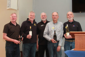 the winning Bremerton YC team of John Burwell, Jim VanAntwerp, TYC Commodore Cliff Rickmers, Rick Randall and the author. 