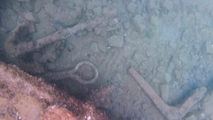 A small anchor and other objects that were observed during the Lost Whaling Fleets expedition. (Credit: NOAA)
