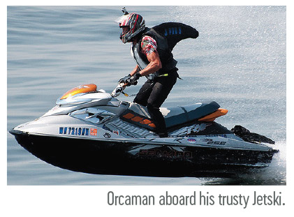 Orcaman aboard his trusty Jetski.